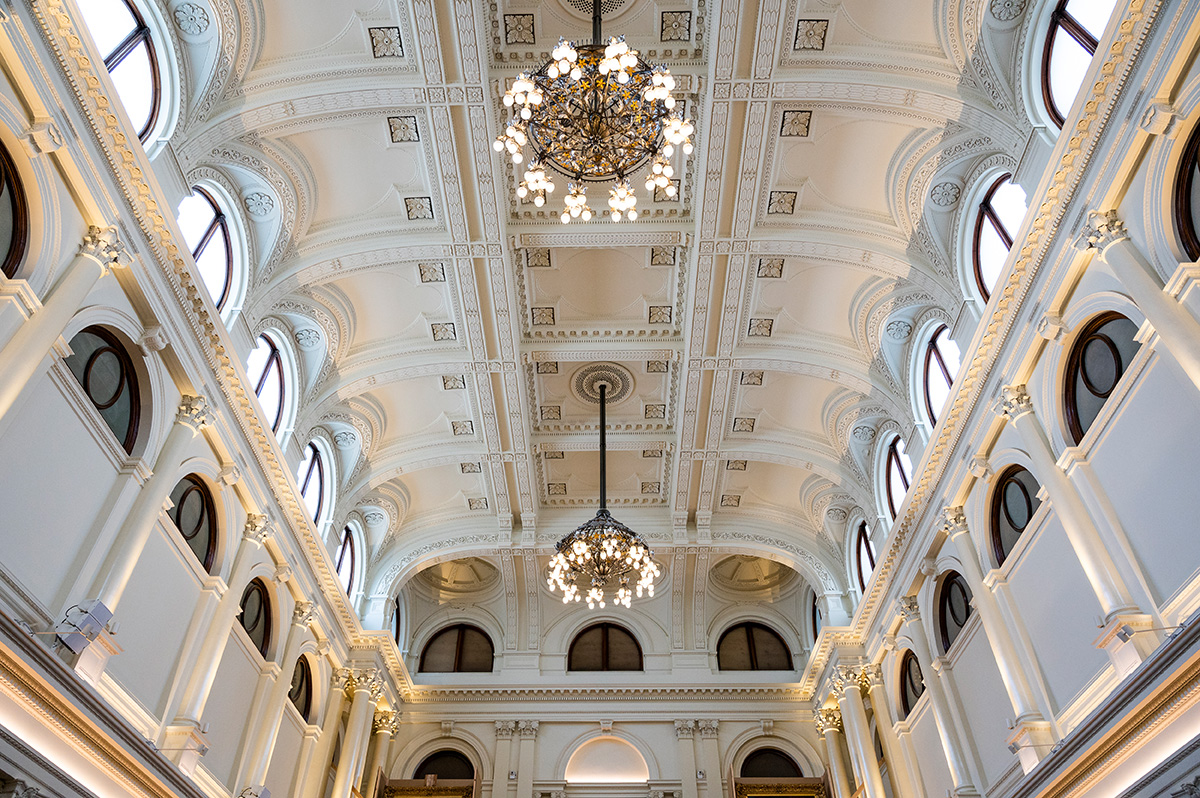 The walls and ceiling of Queen's Hall, without the detailed gold leaf decoration seen throughout the rest of the building.