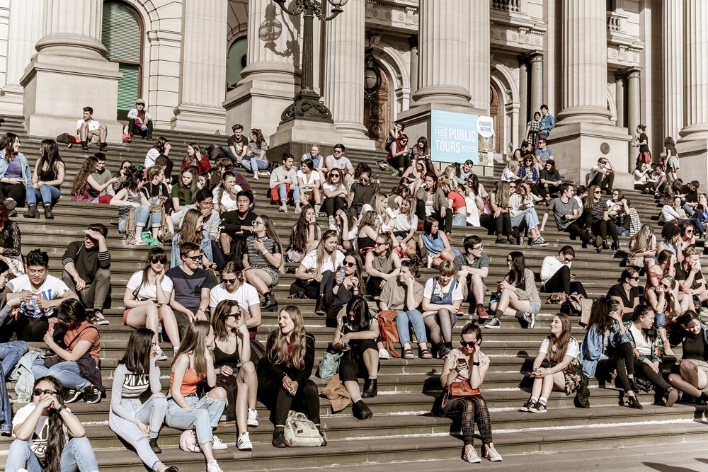 Young people on the steps of Parliament House