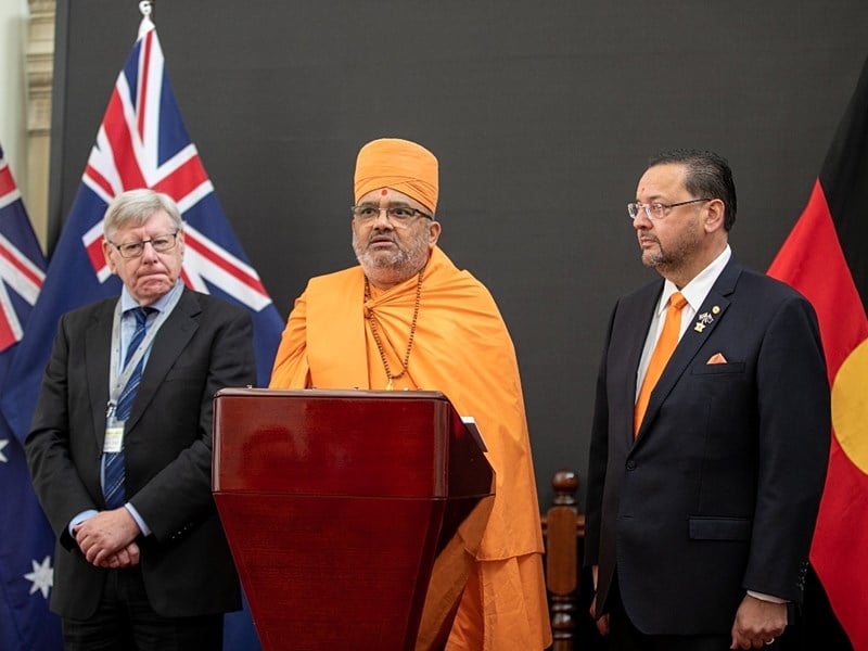 Swami Bhadreshdas welcomed to Parliament House by Members of the Legislative Council, Bruce Atkinson and Craig Ondarchie.